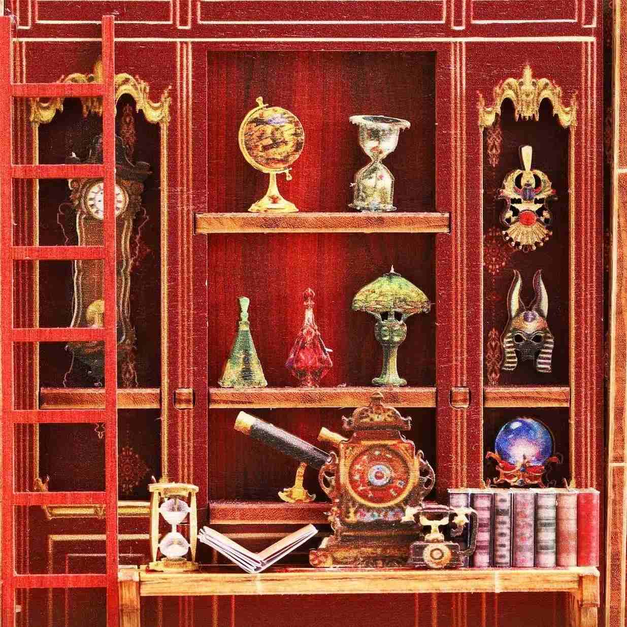 Decorative miniature wooden shelf with various antiques and books