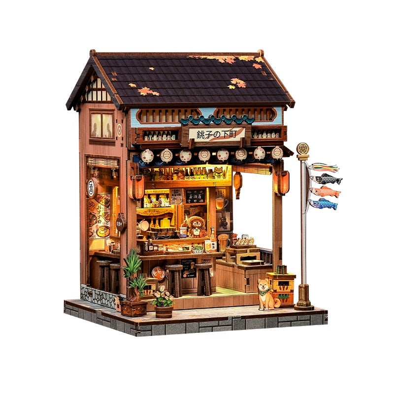 Detailed Book Nook of a traditional Japanese restaurant with various elements and a street lamp.