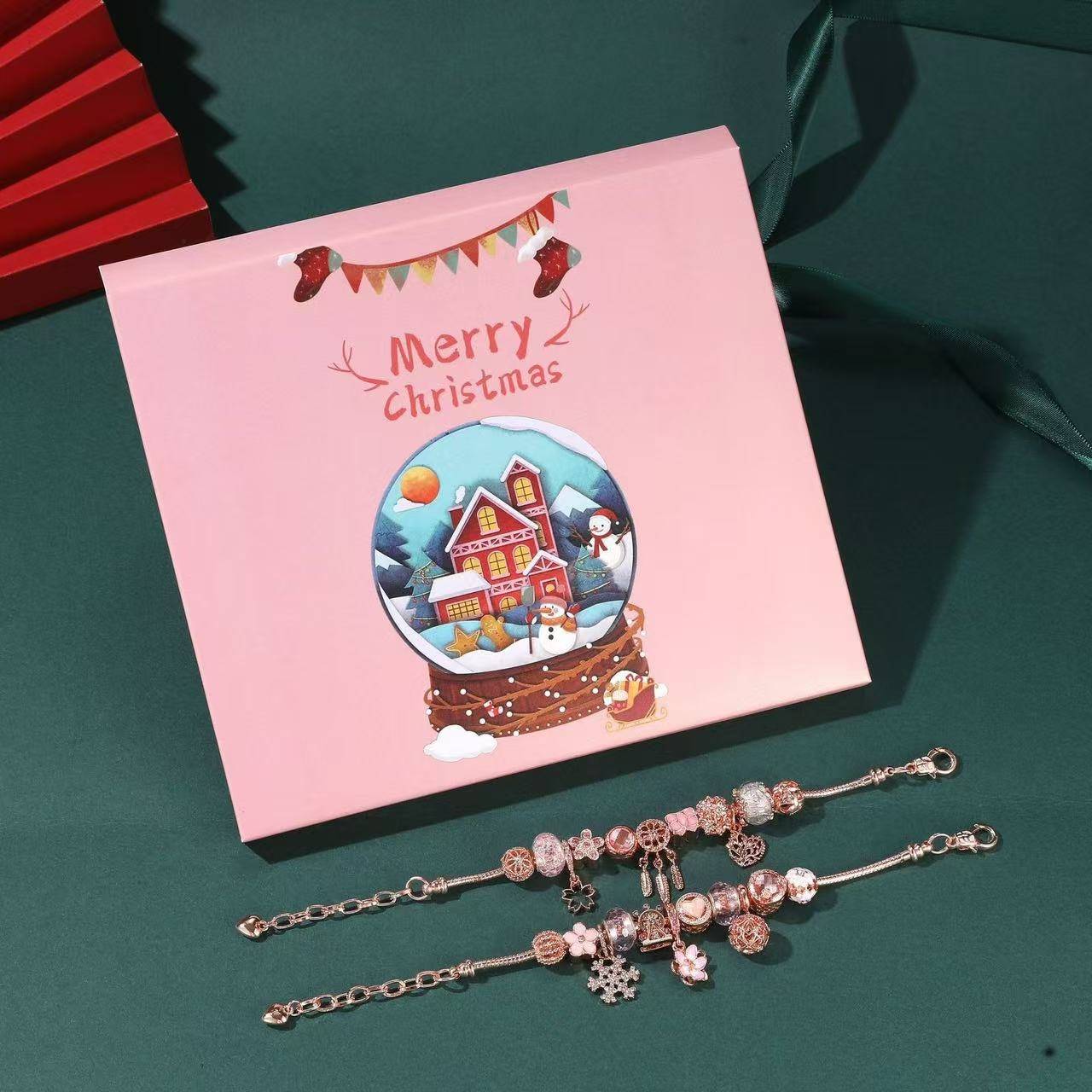 2 finished charms of the DIY Christmas Advent Calendar Charm Bracelet Set
