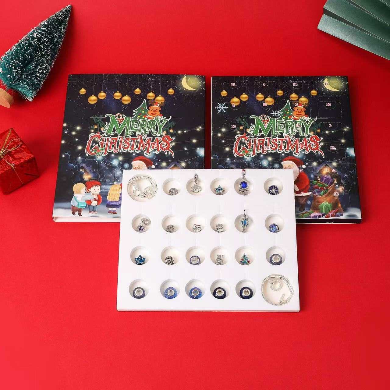 image displaying the charm of Starry Sky Blue Christmas Countdown Advent Calendar DIY Charm Bracelet in the box