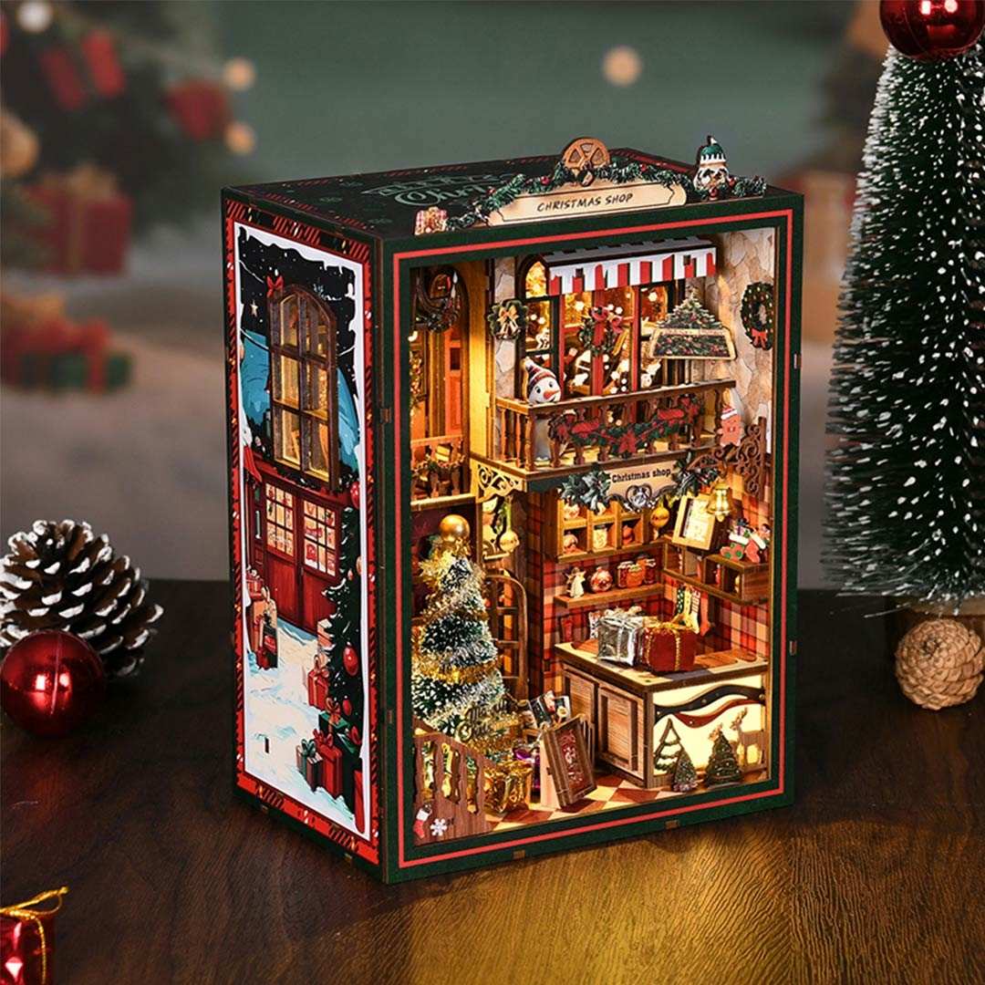 Christmas shop scene inside a book nook box with lights on a festive background