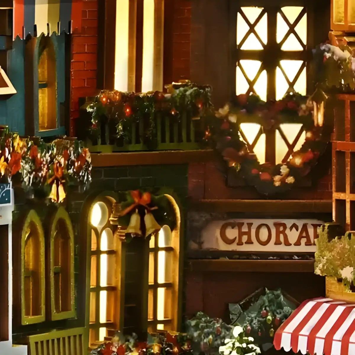 Decorative Christmas scene with a lit-up building facade, wreaths, and festive decorations.