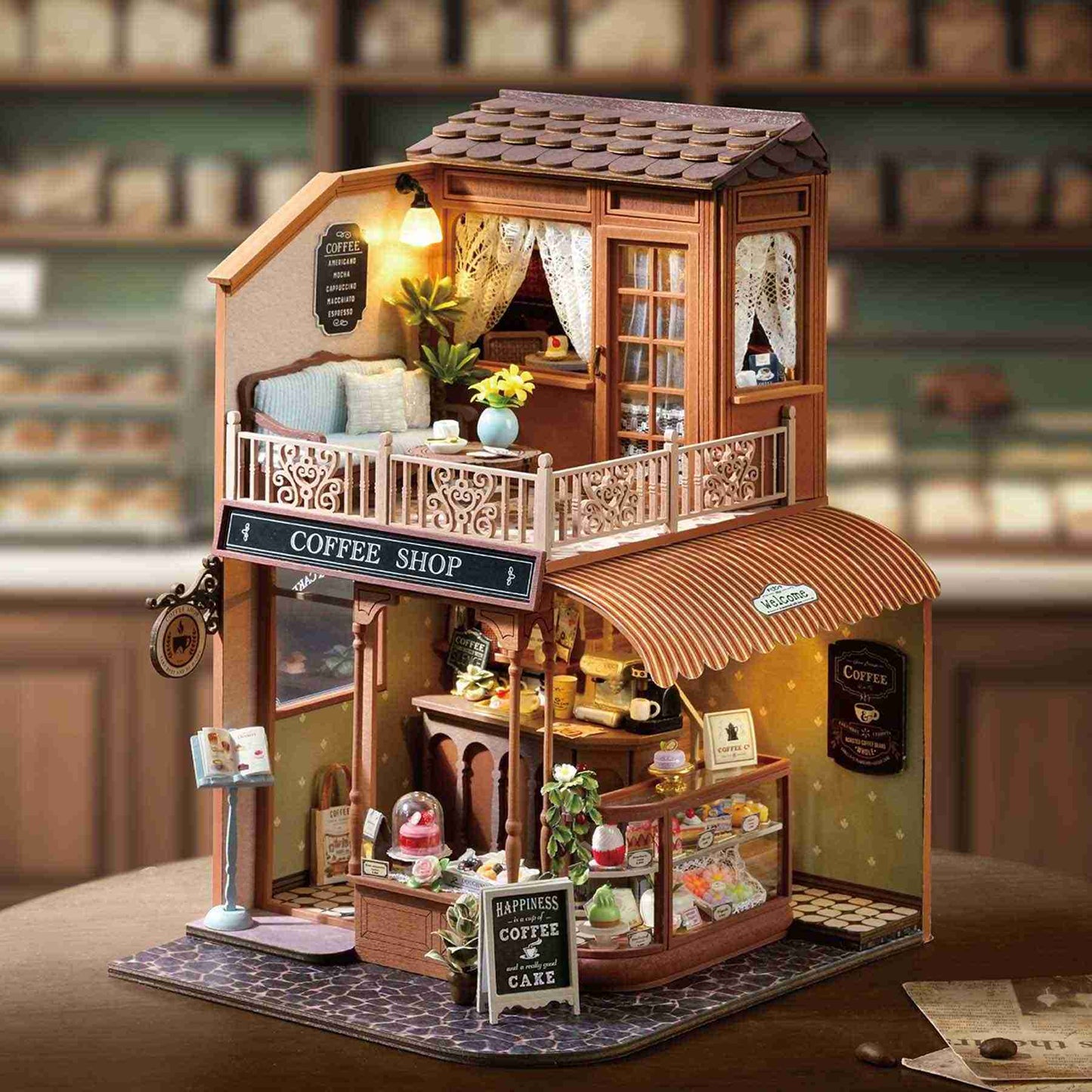 assembled Dollhouse of a coffee shop with detailed interior and exterior elements.