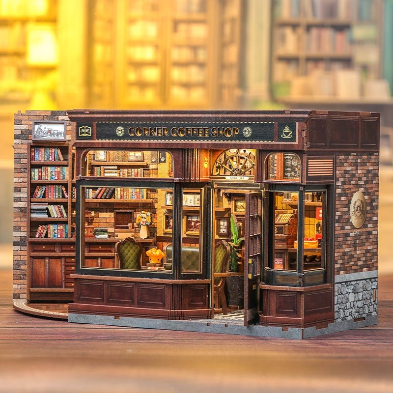 image displaying a Corner Coffee Shop DIY Miniature House Kit in a bookshelf setting
