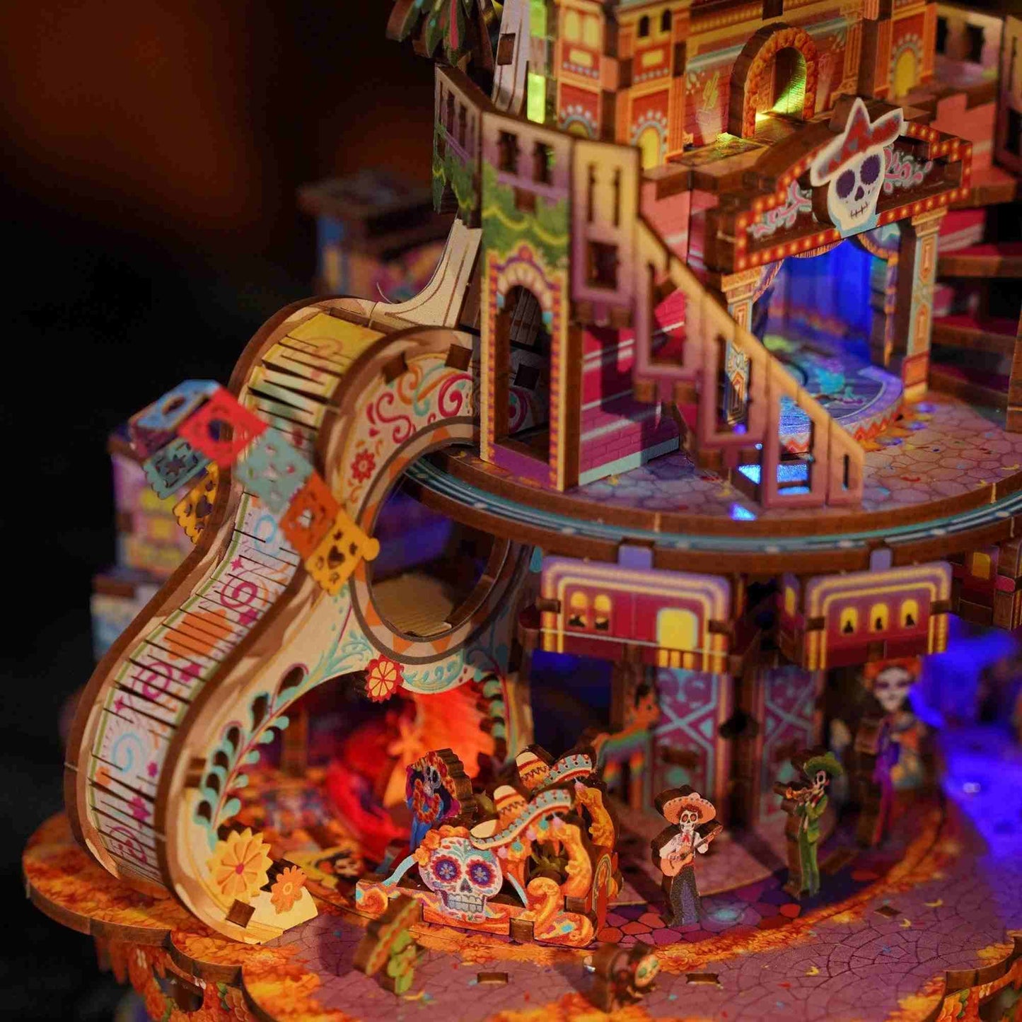 Colorful Coco-Inspired 3D puzzle with illuminated interior and characters