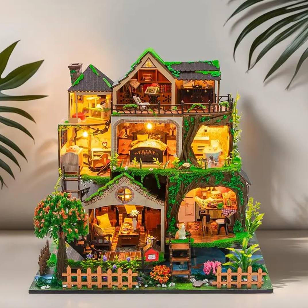 assembled and lit Fairy Tale Forest Miniature House on table in daytime