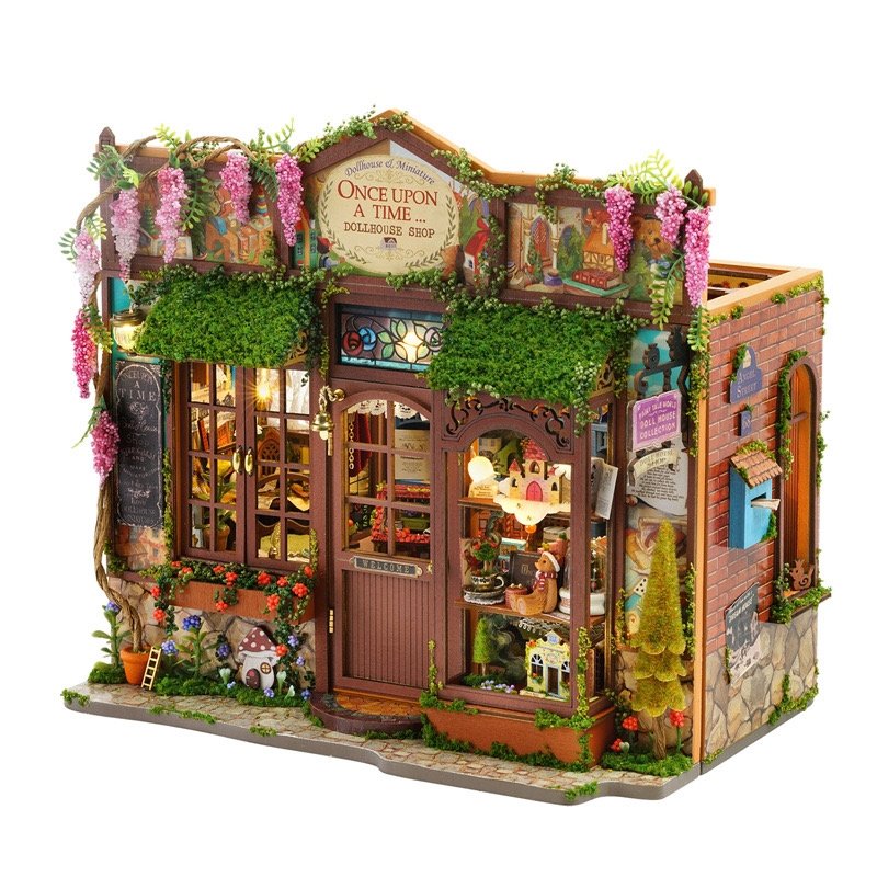 Detailed model of Fairy Tale dollhouse shop with decorative elements on a white background