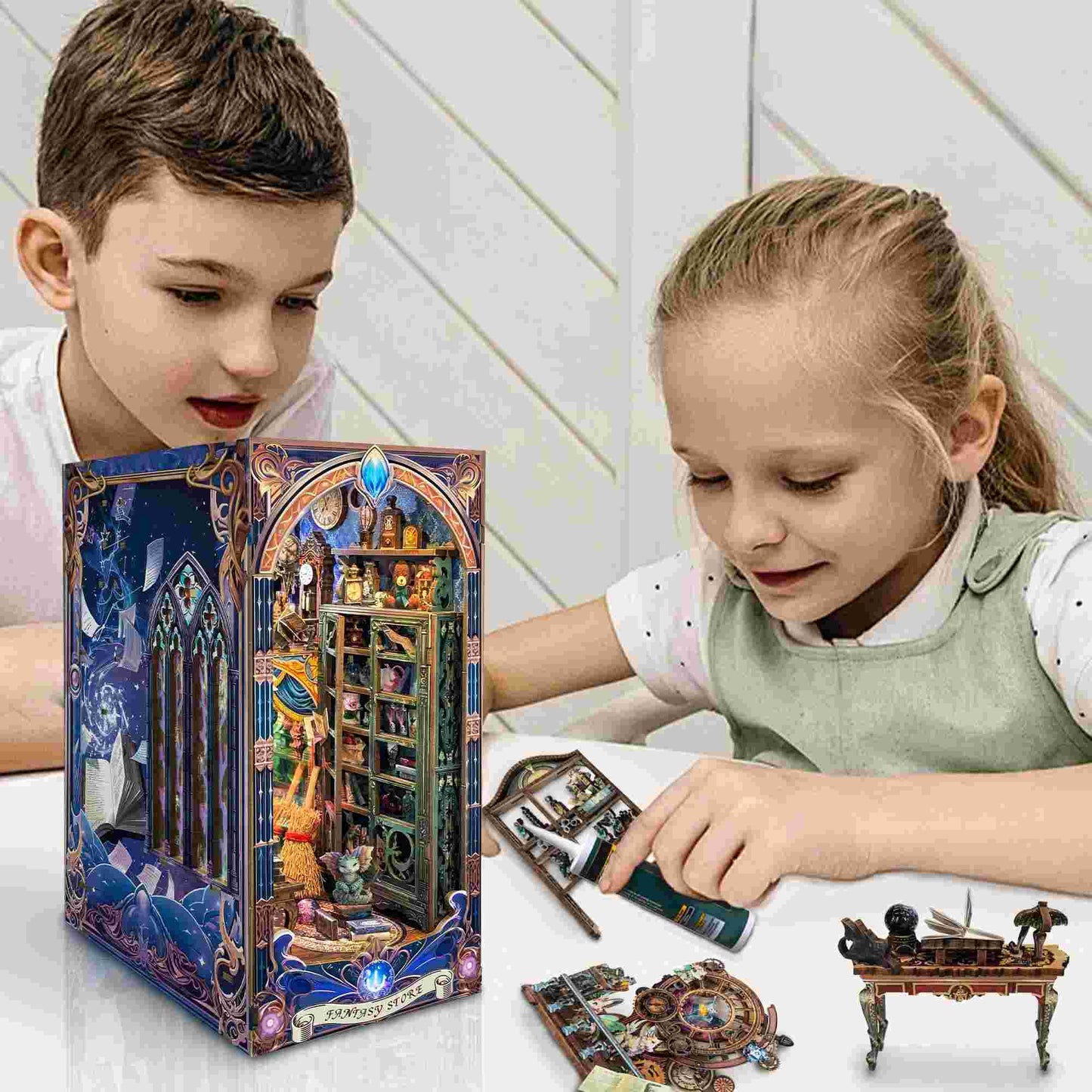 image displaying two kids are assembling the Fantasy Store DIY Book Nook Kit