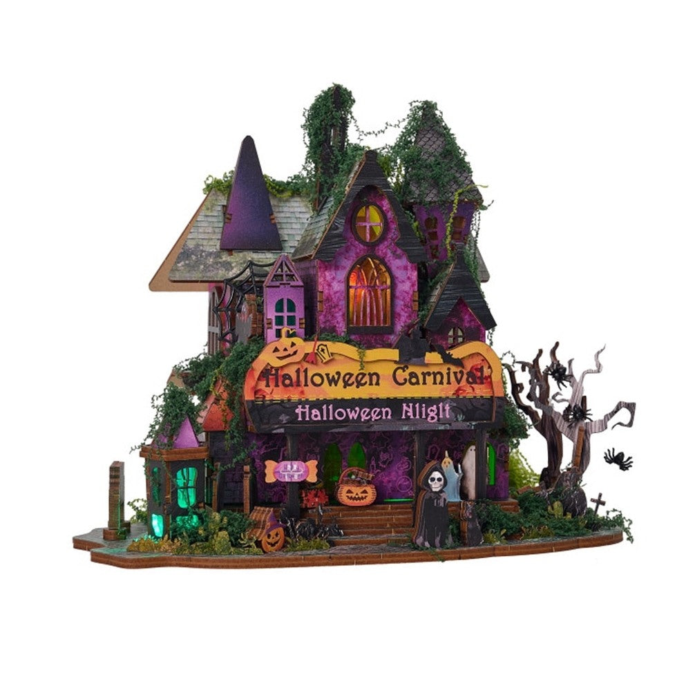 Halloween-themed miniature model house with decorative elements on a white background