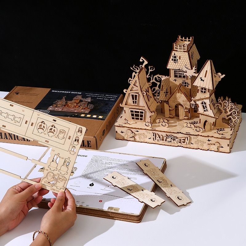 image displaying the puzzles of Haunted House 3D Wooden Puzzles are putting together
