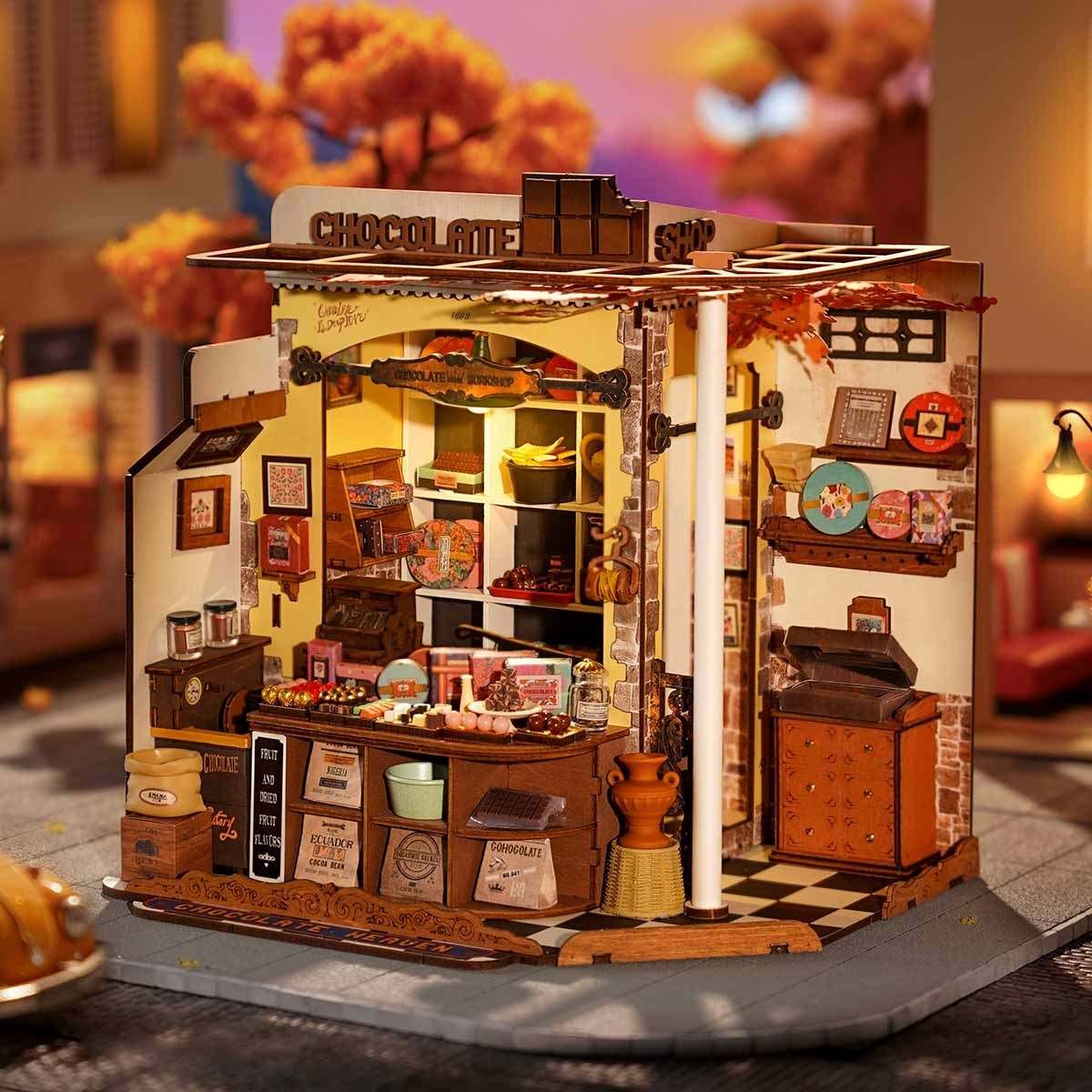Detailed model of a chocolate shop with various items and decorations.