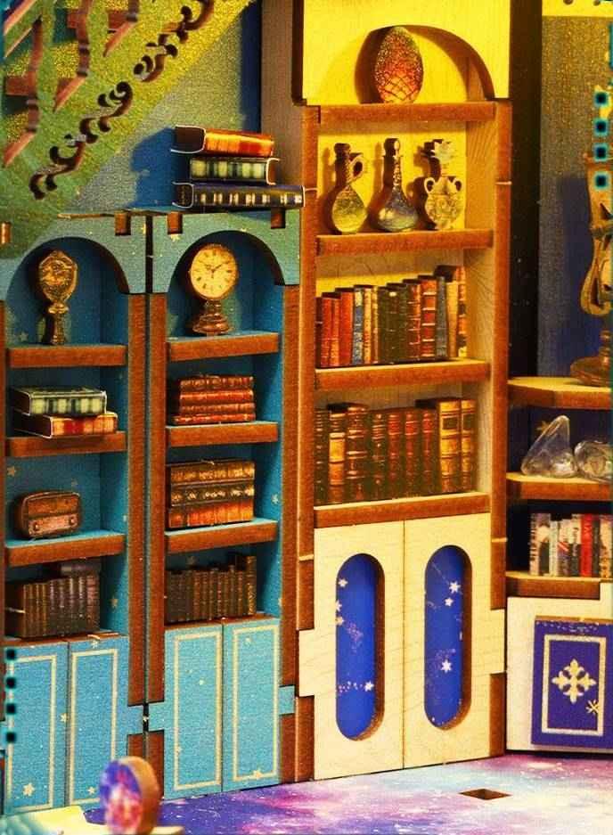 Interstellar Exploration DIY Book Nook Kit, a charming universe theme bookshelf insert decor, perfect for crafting enthusiasts and dollhouse collectors alike. - scene 1