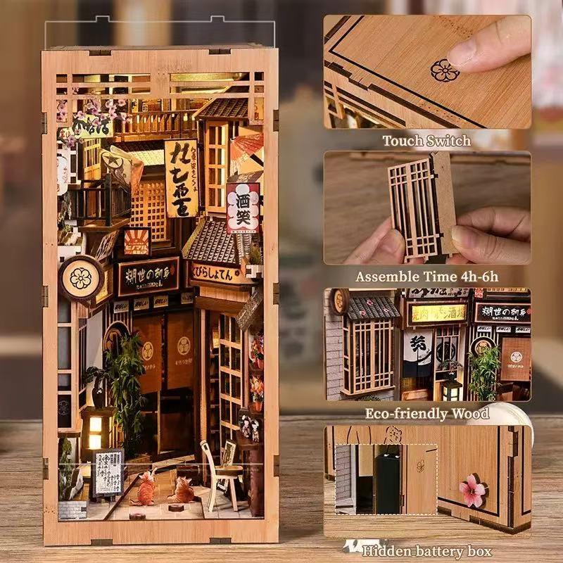 Wooden book nook model kit of a miniature Japanese street scene with detailed components and assembly instructions, and features highlighted