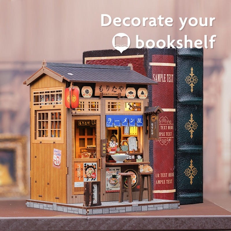 Miniature model of a Japanese ramen shop with books as a bookshelf decorative piece
