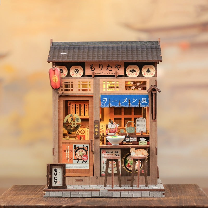 Miniature House Model of a Japanese ramen restaurant with detailed interior and exterior on a wooden table