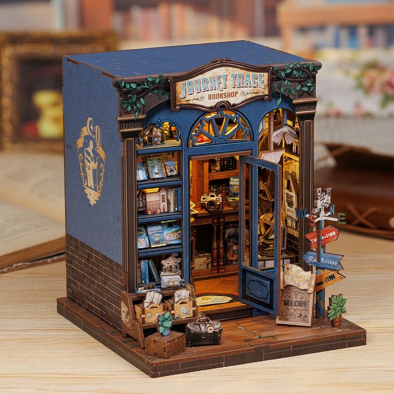 image displaying a left 45 degree view of Journey Trace Bookshop DIY Book Nook Kit on table