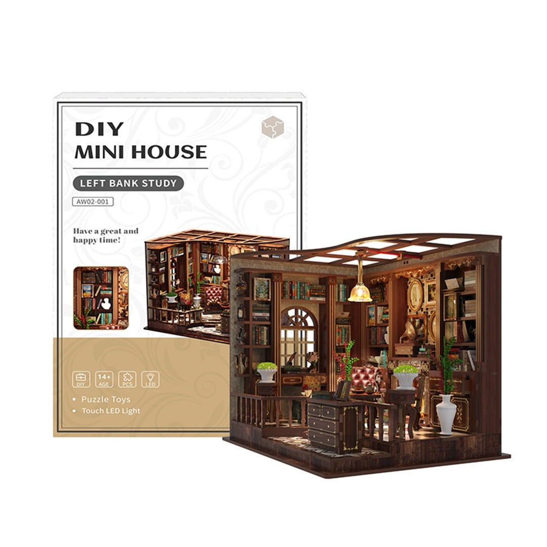 displaying the assembled Left Bank Study Room dollhouse and its package