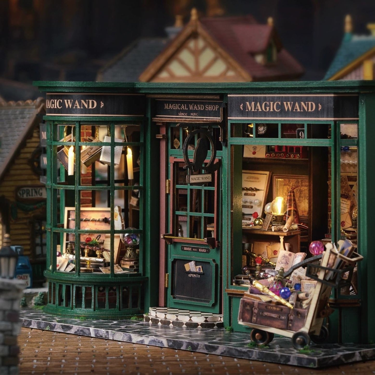 image displaying finished Magic Wand Shop DIY Miniature House Kit in a retro style table setting