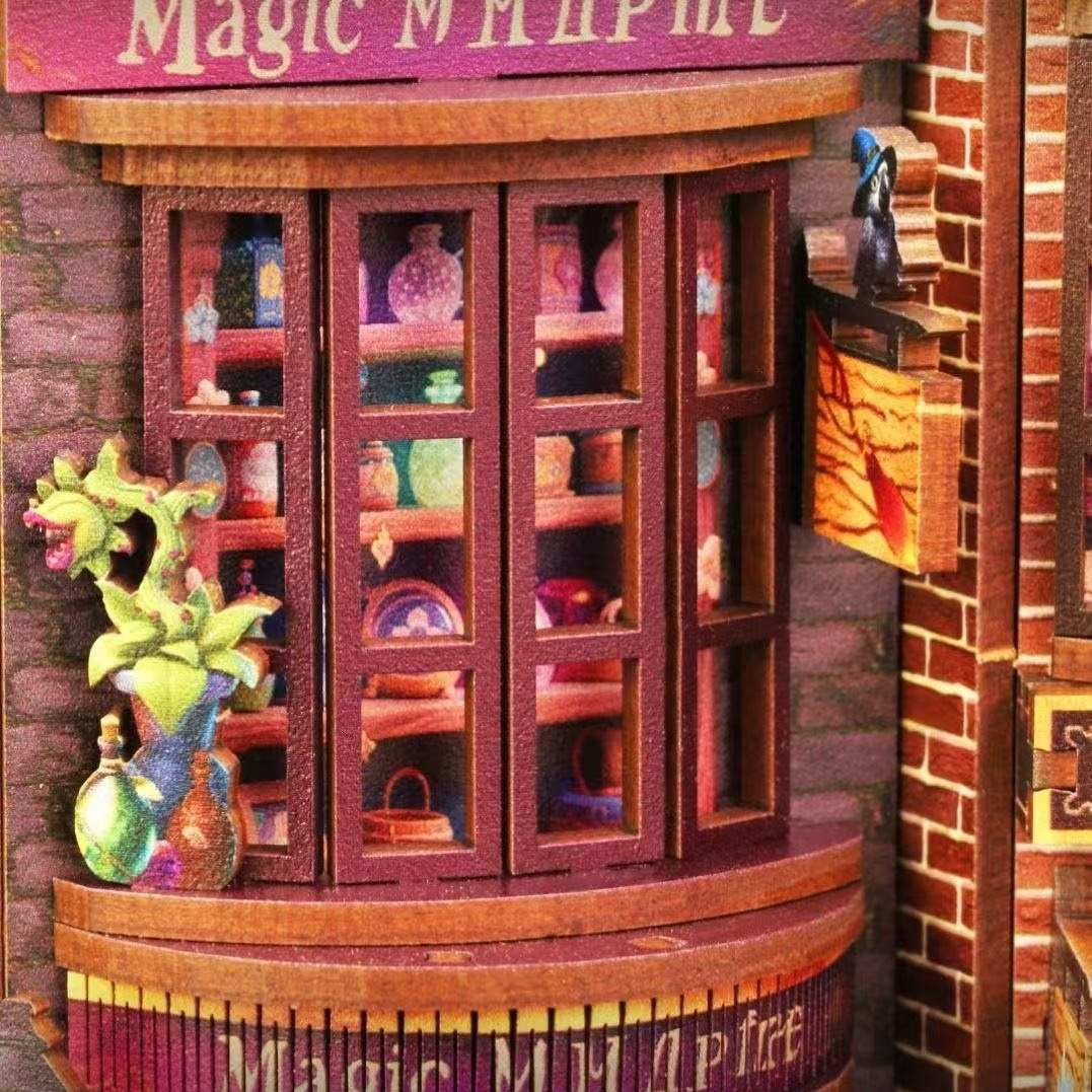 Wooden miniature cabinet with glass doors displaying various colorful potion items, set against a brick wall.