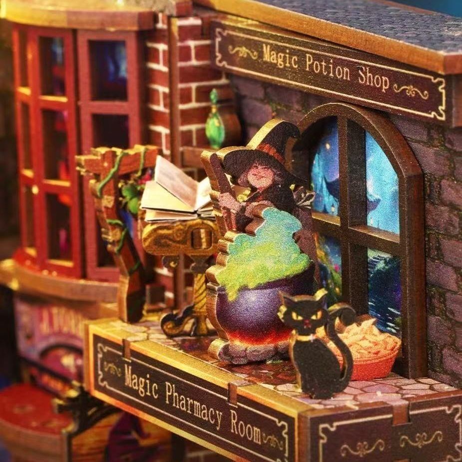 Miniature model of a 'Magic Potion Shop' with a witch and potion.