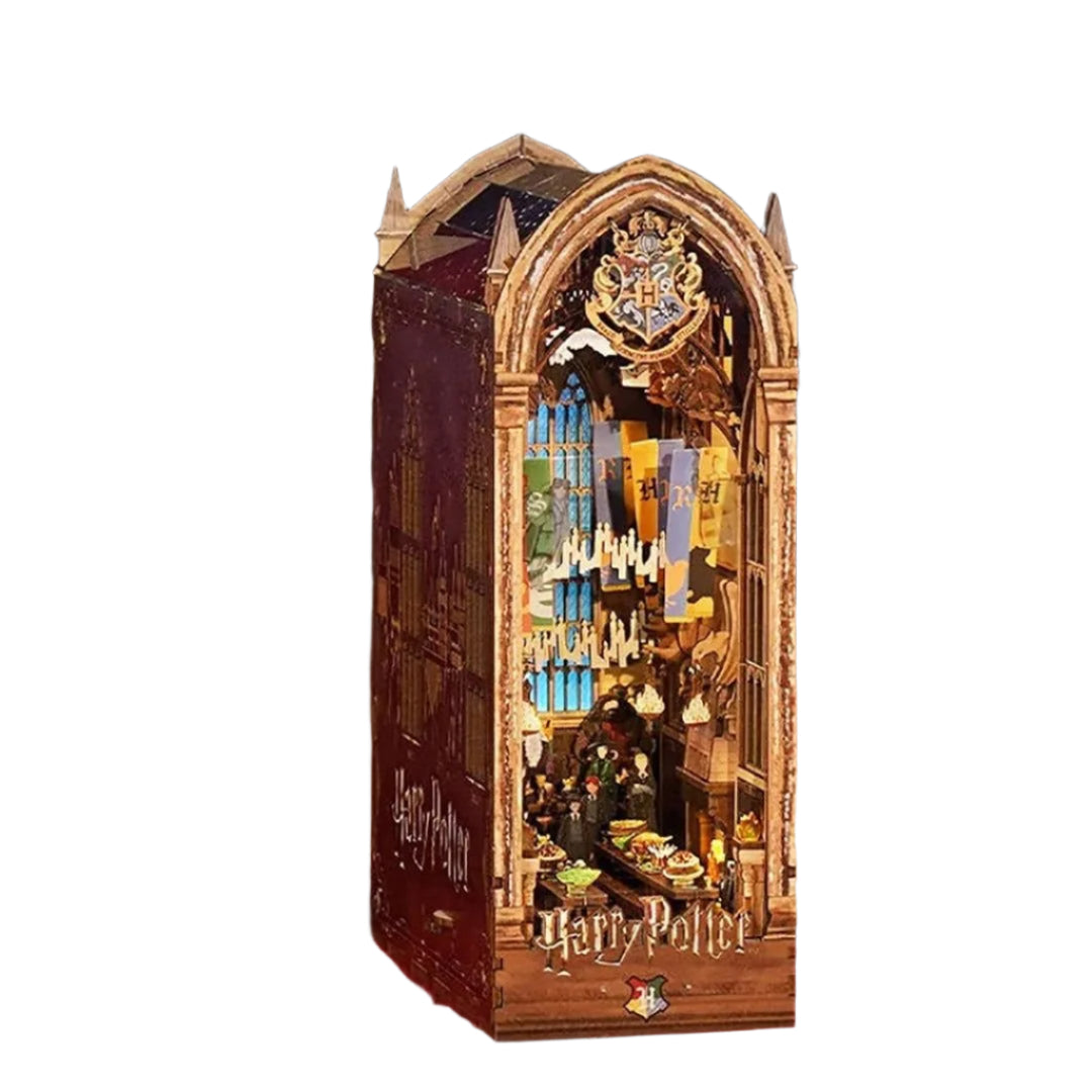Miniature model of a magical bookshelf from 'Harry Potter' series on a red surface.