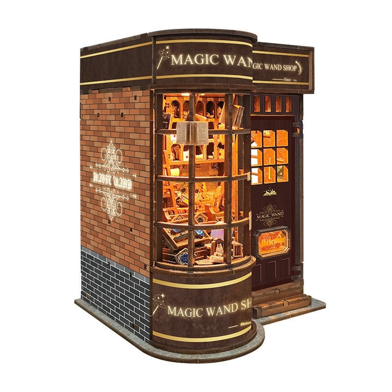 the left side view of Model of a 'Magic Wand Shop' with illuminated interior on a white background