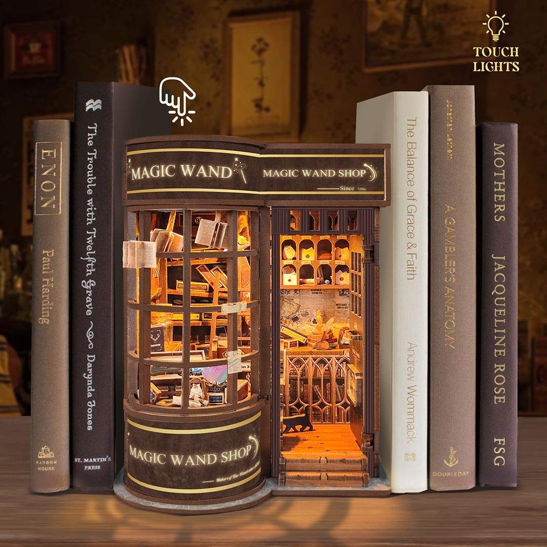 Decorative bookshelf with a 'Magic Wand Shop' design, surrounded by books, featuring the feature 'Touch Lights'.