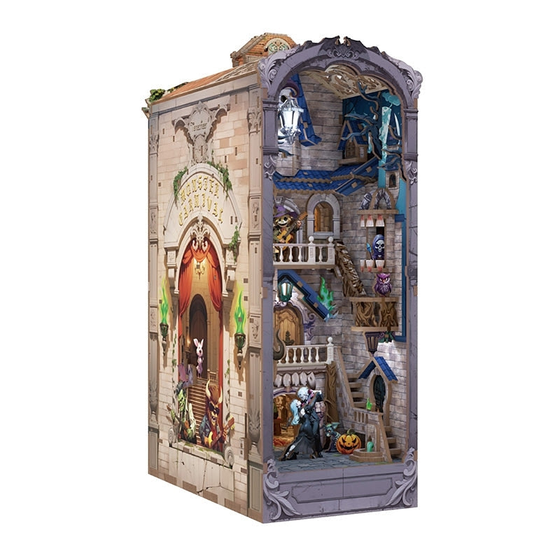 book nook model of a castle with various figures and decorations
