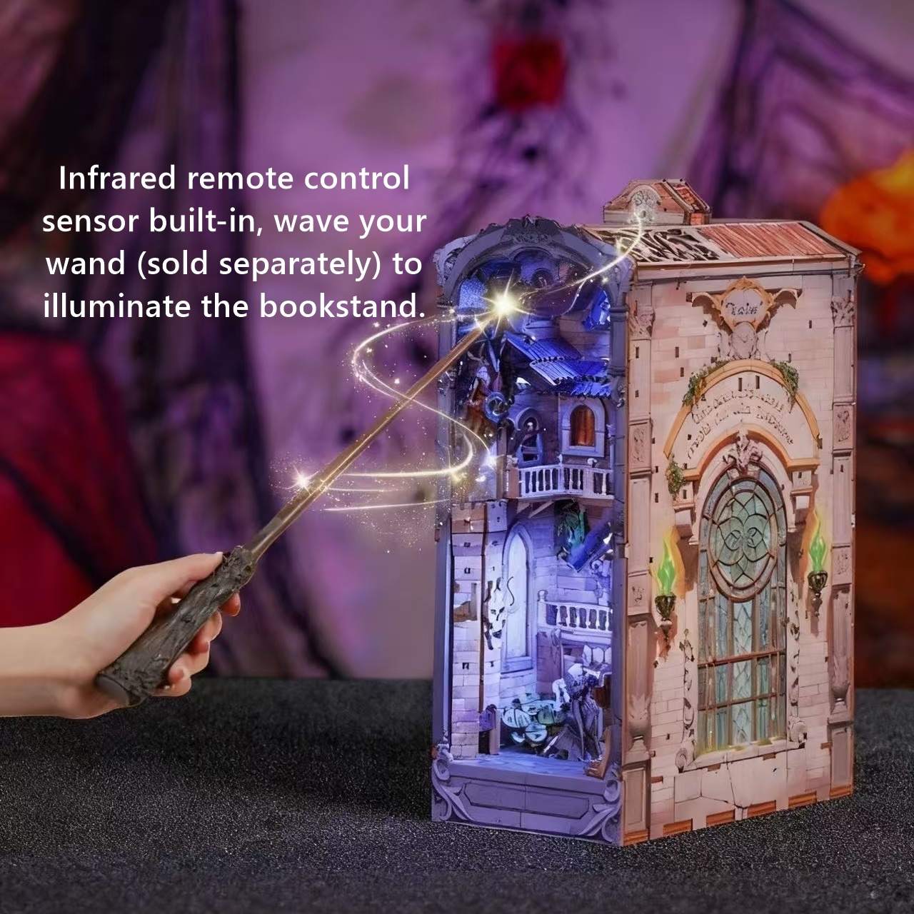 spooky bookstand with castle design illuminated by an infrared remote control wand