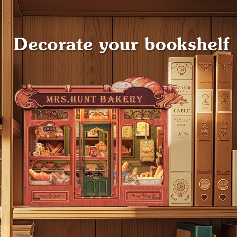 image displaying the Mrs. Hunt’s Bakery Shop DIY Dollhouse Kit in bookshelf setting