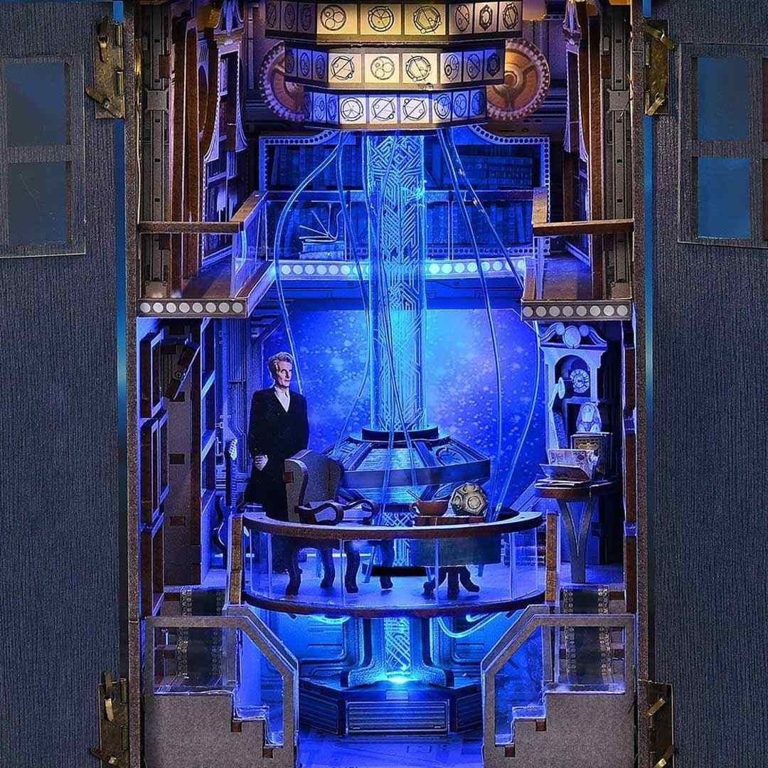 Stylized interior of a Blue Box Book Nook with a central figure, blue lighting, and intricate design elements.