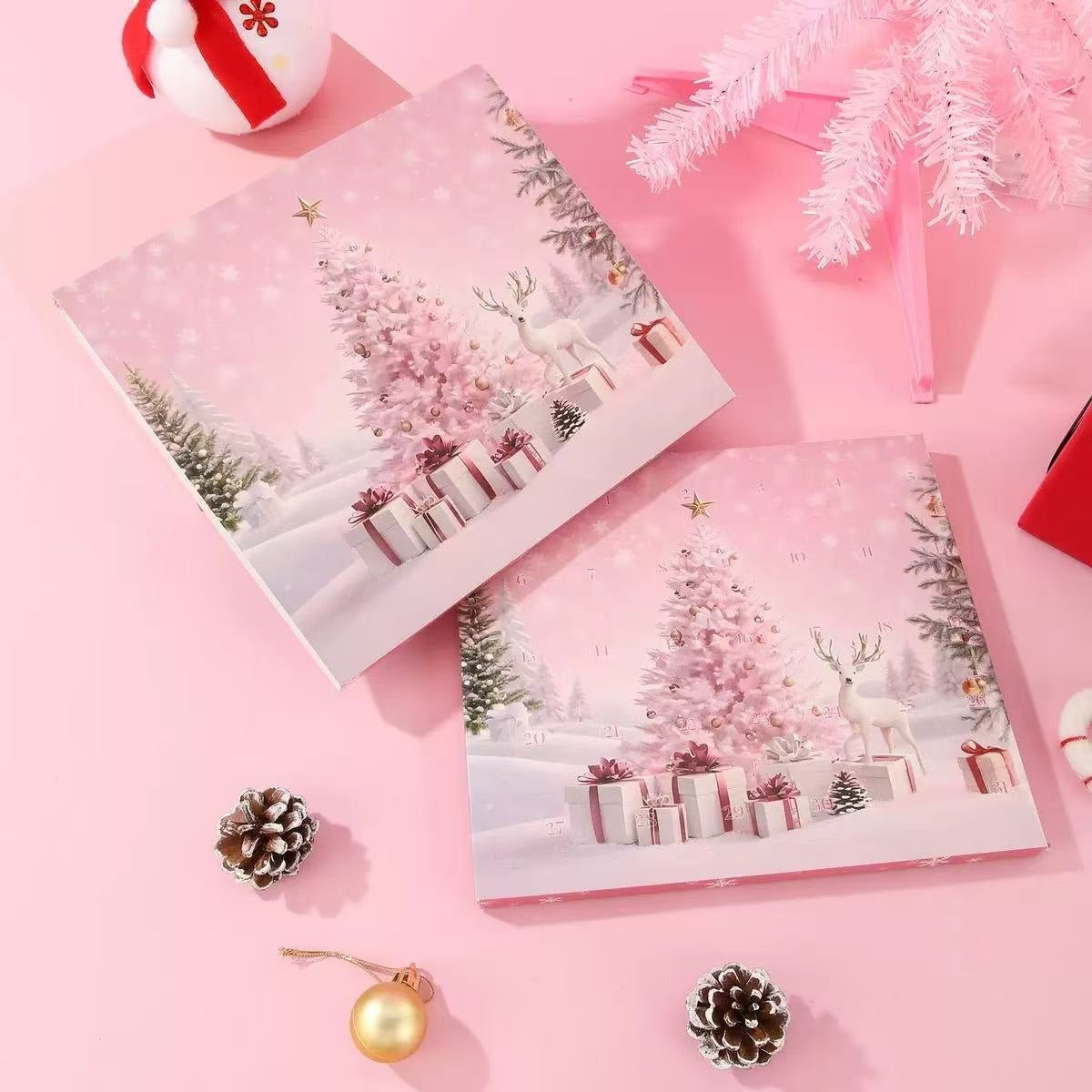 Two Christmas-themed packing box on a pink background with festive decorations.