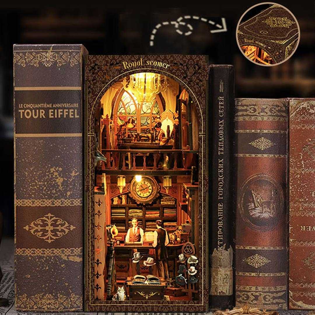 image displaying the touch switch for warm light of Royal Tailor Shop DIY Book Nook Kit in a bookshelf setting