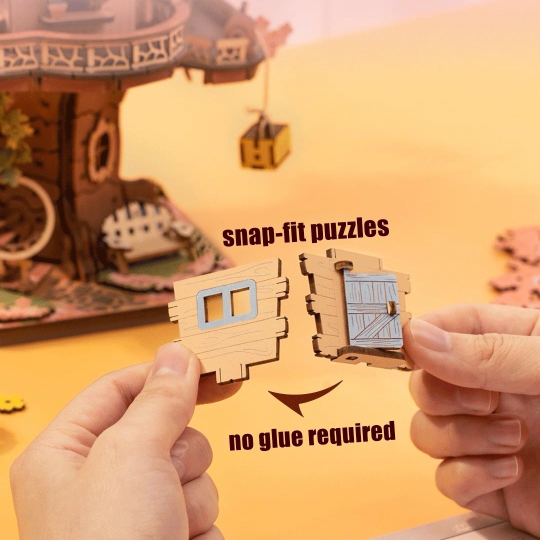 Wooden snap-fit puzzles held by hands