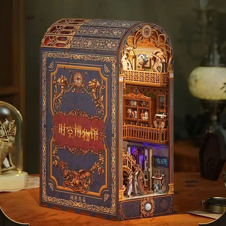 Image displaying the left side finished Spacetime Museum DIY Book Nook Kit in a vintage table setting
