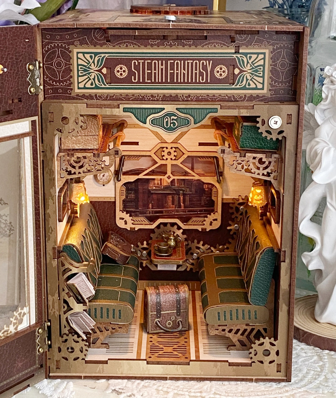 close-up of Steampunk Fantasy Infinite Train Cabin DIY Book Nook Kit