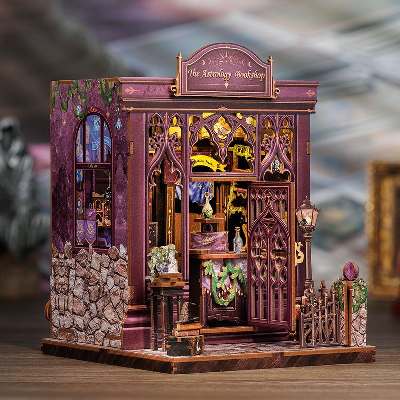 image displaying a left 45 degree view of The Astrology Bookshop DIY Book Nook Kit on table