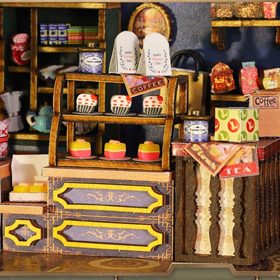 Miniature coffee shop setup with shelves and counter