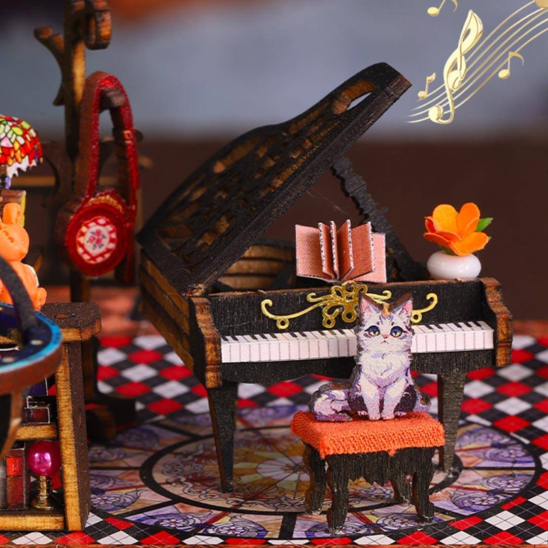 Miniature piano with a cat sitting on a stool, surrounded by decorative items on a checkered floor.