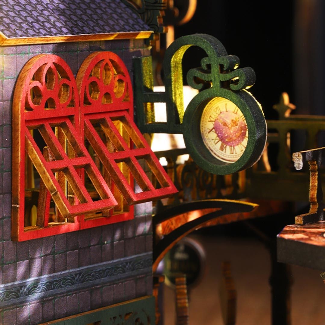 Close-up of a decorative clock, and opened windows with intricate details