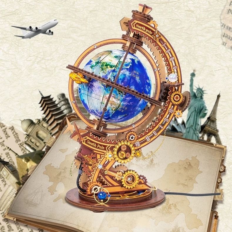 metal globe model with mechanical design on an open book, surrounded by world landmarks.