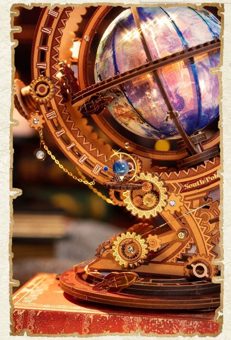 Detailed mechanical metal model with gears and a colorful globe on a wooden base.
