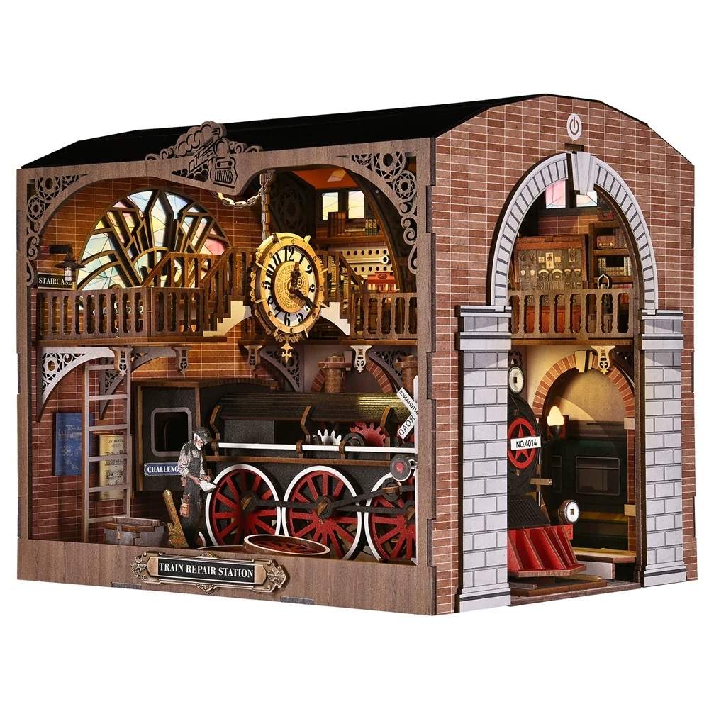 Detailed miniature model of a train repair station with intricate design elements on white background