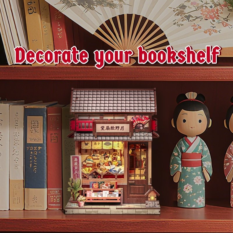 Decorative bookshelf with a small miniature house Japanese store, books, and dolls.