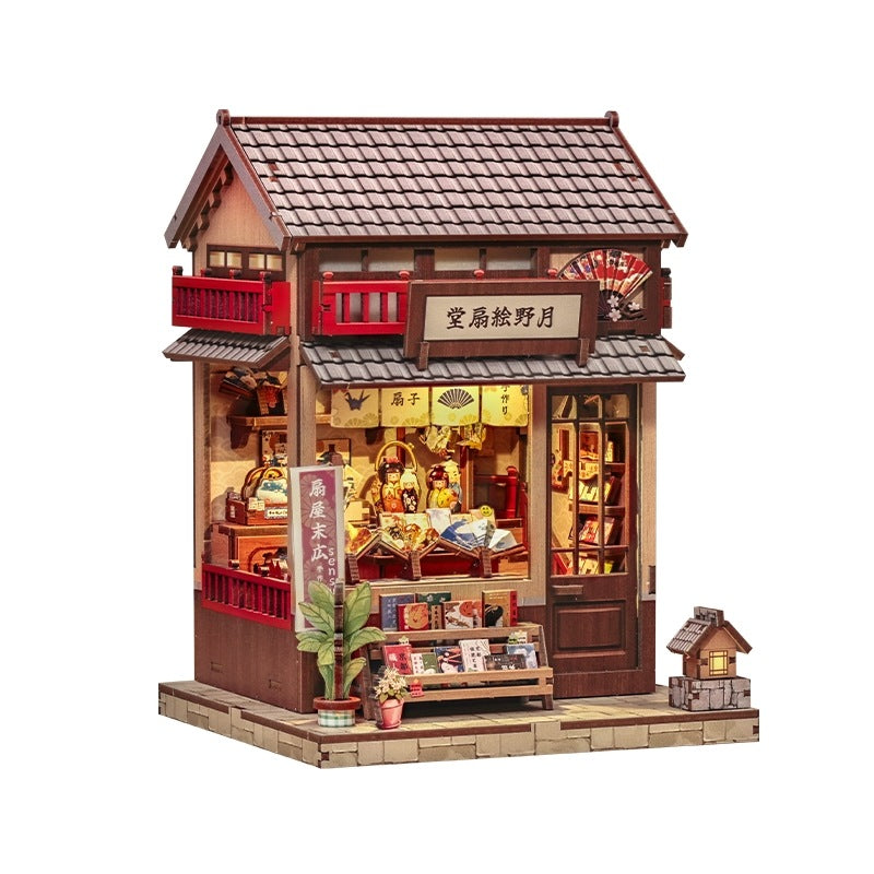Miniature House Model of a Japanese shop with detailed items in white background