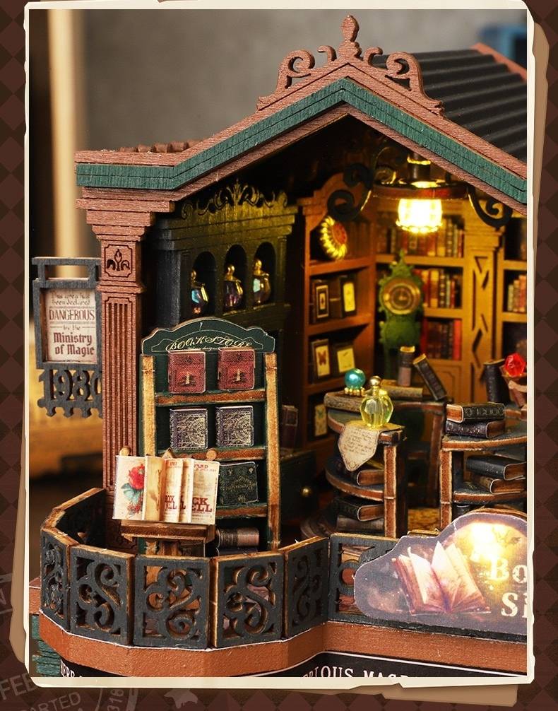 image displaying miniature bookshelves filling with books  on the second floor of the Twilight Bookstore DIY Miniature House Kit with lights on