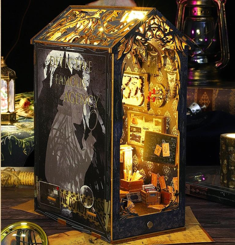 famous detective agency diy book nook kit, inspired by the famous detective Sherlock Holmes, A charming miniature 3d wooden puzzles bring the mysteries of Victorian London to life in authentic miniature scenes, perfect for bookshelf decor, and dollhouse collectors, or a gift for Sherlock Holmes fans. - left