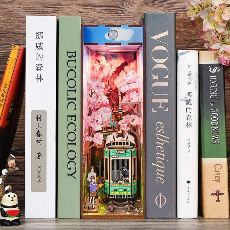 Japanese Sakura Densya DIY Book Nook Kit, A charming miniature 3d wooden puzzles the captures the essence of springtime in Japan, perfect for bookshelf decor or a delightful gift for Japanese culture lovers.