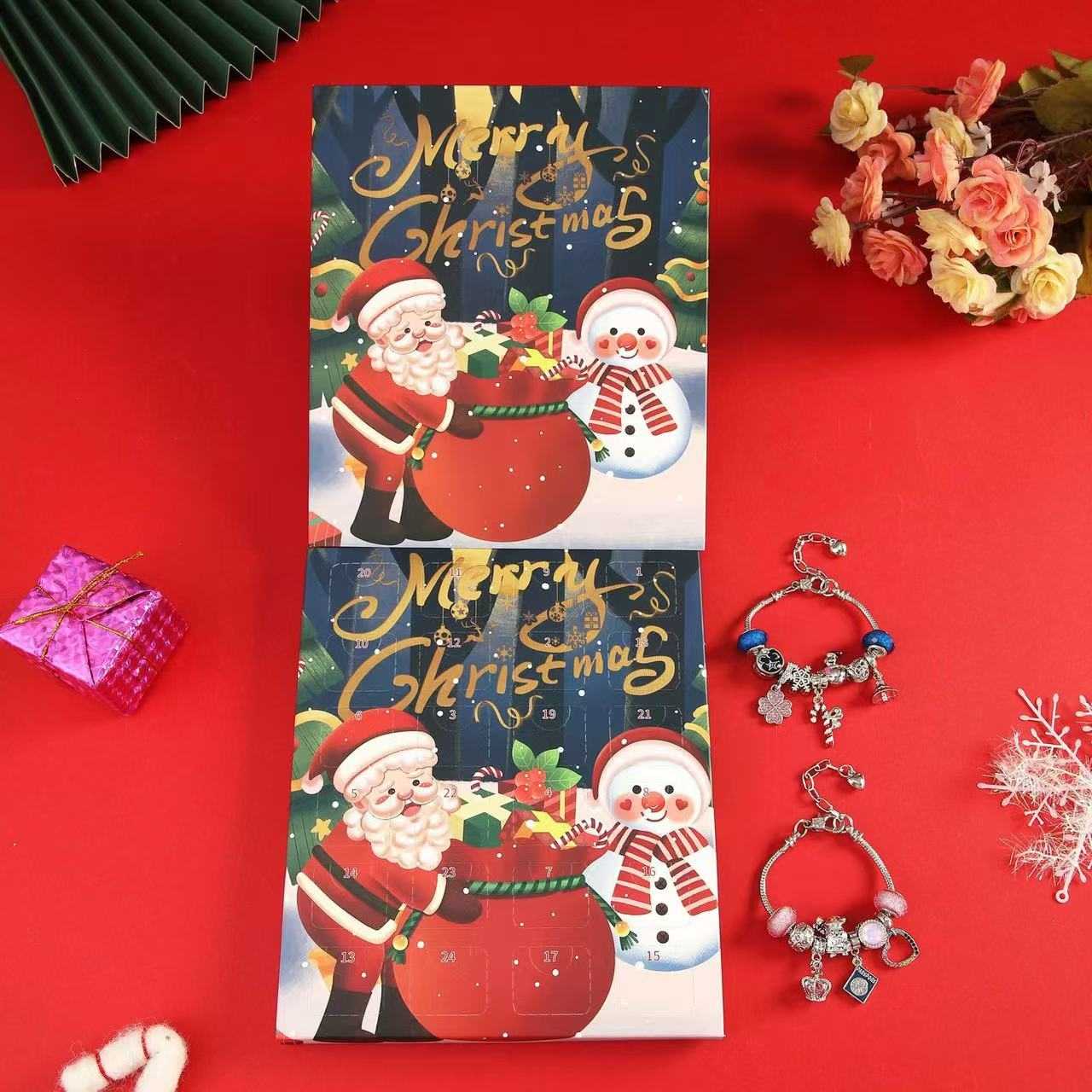 image displaying package and 2 finished bracelets of 24 Days Christmas Countdown Advent Calendar Bracelet Set