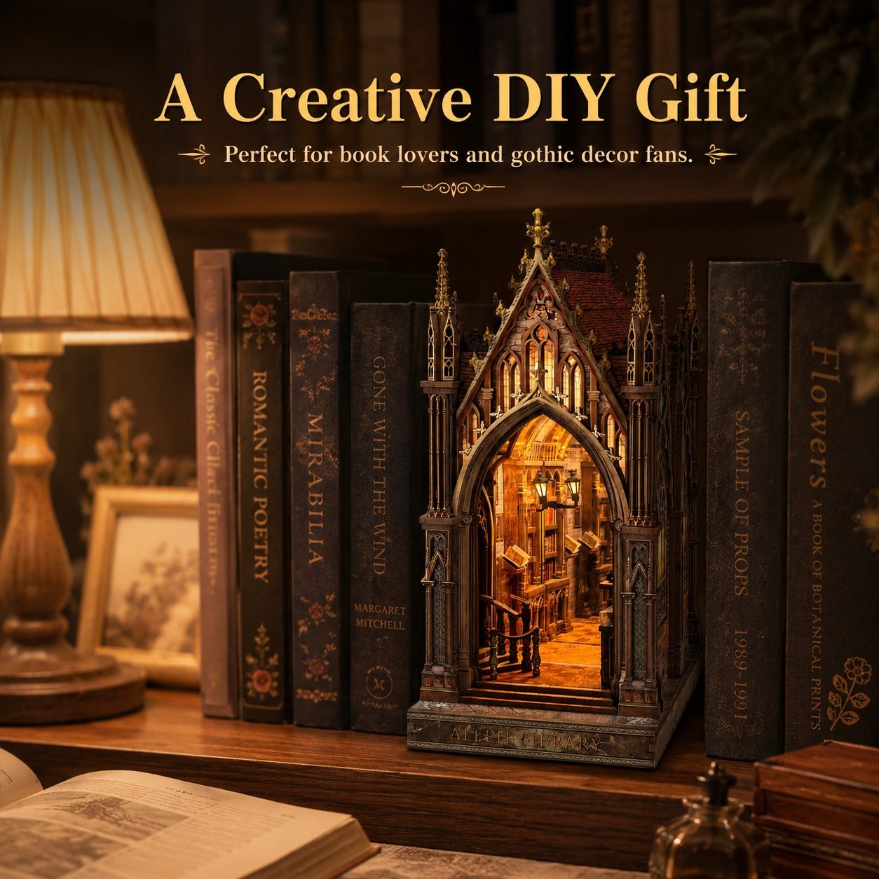 A decorative gothic cathedral-style miniature book nook set on a wooden shelf, surrounded by faux books, with a lamp and books in the background. Text at the top reads 'A Creative DIY Gift' and 'Perfect for book lovers and gothic decor fans.